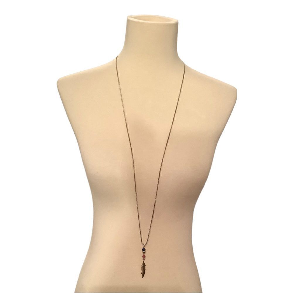Gold tone necklace with leaf and beads. NWOT